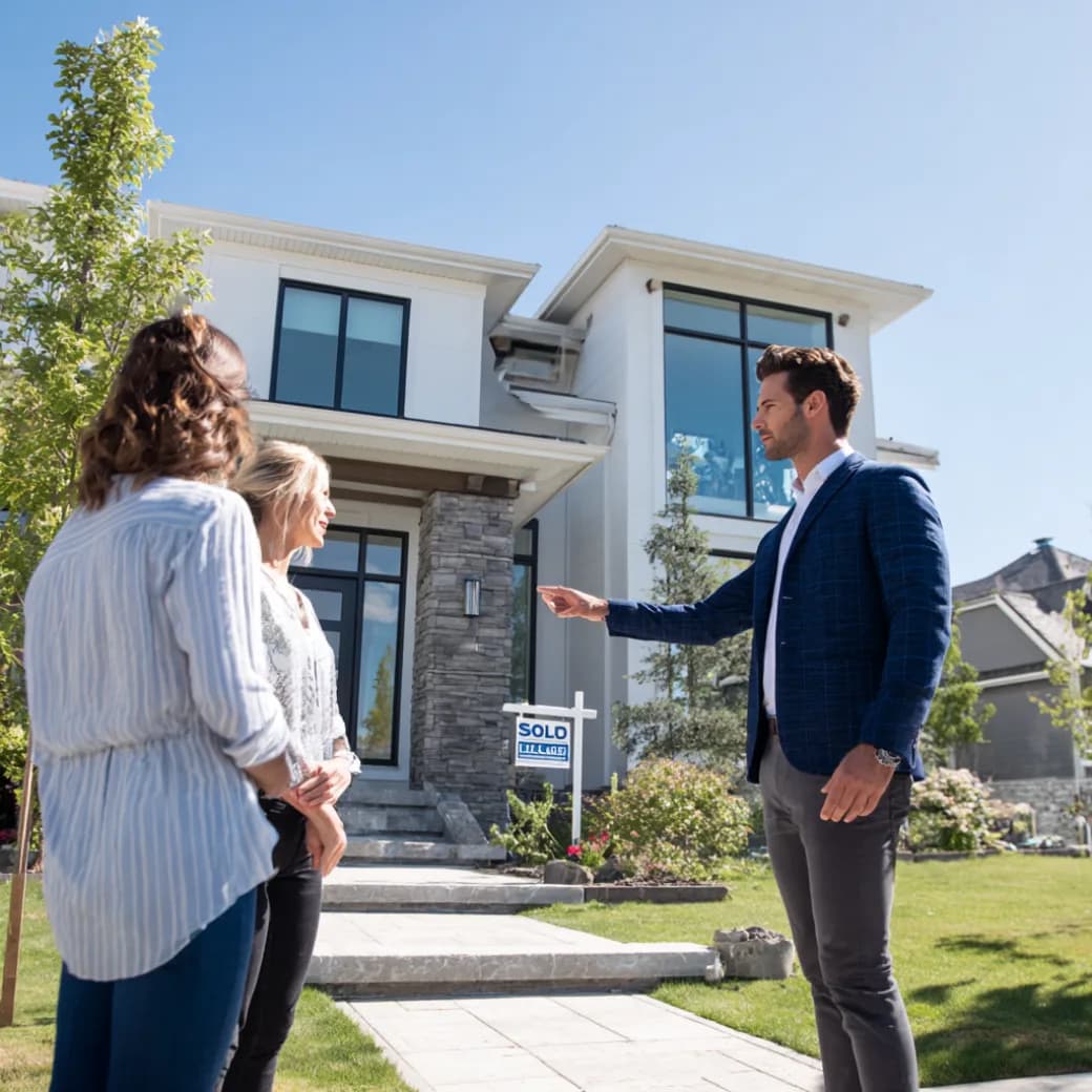 Real estate professionals reviewing listings