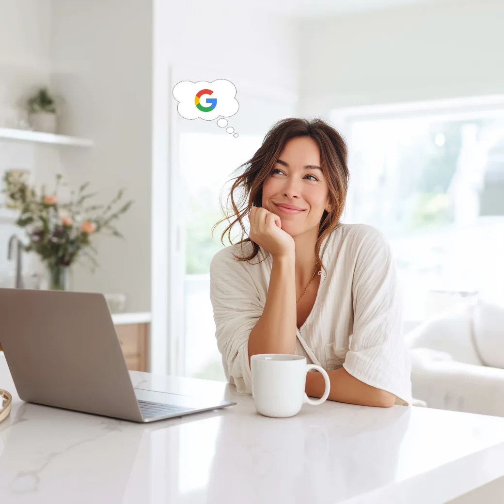 Homeowner Googling contractors at her kitchen counter