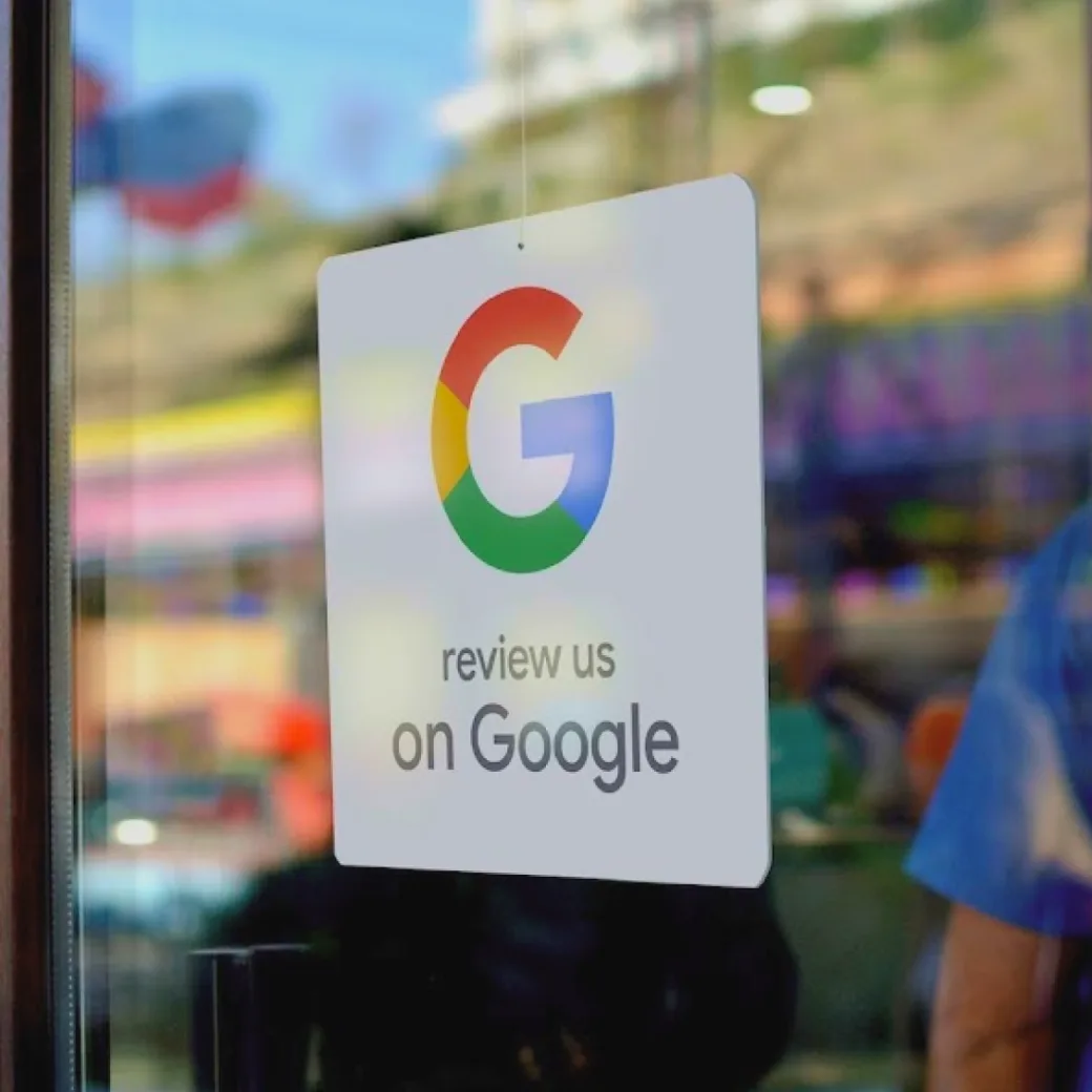 Review us on Google sticker on storefront window